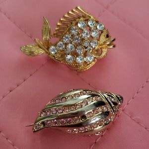 Coastal theme brooches